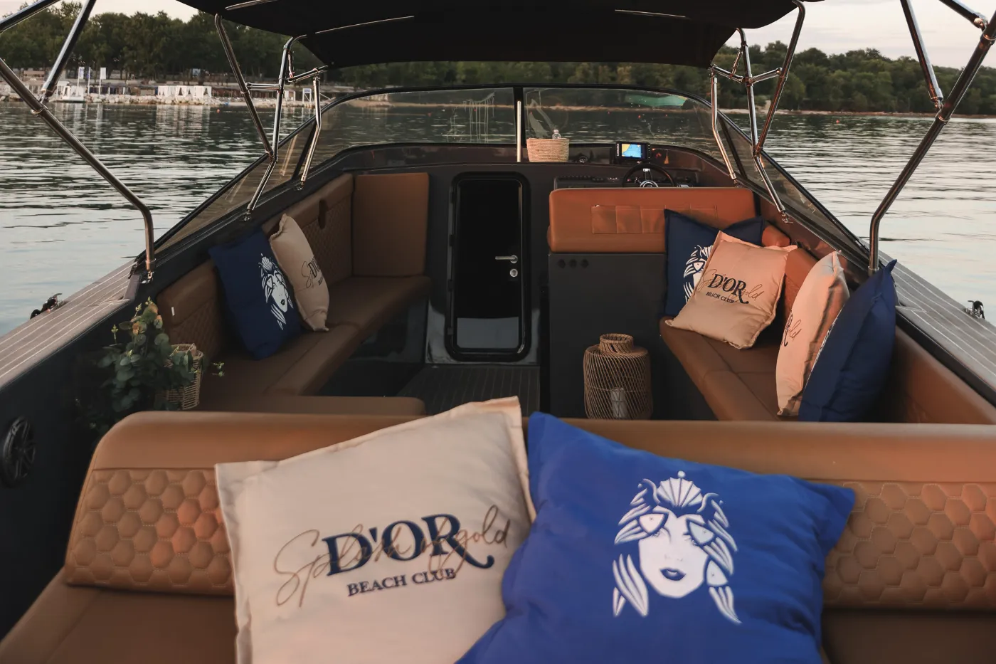 Lounge deck of SOPHIE boat with D'Or cushions